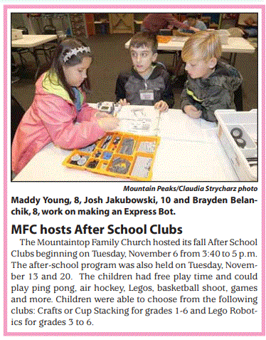 Maddy Young, 8, Josh Jakubowski, 10 and Brayden Belanchik, 8, work on making an Express Bot.